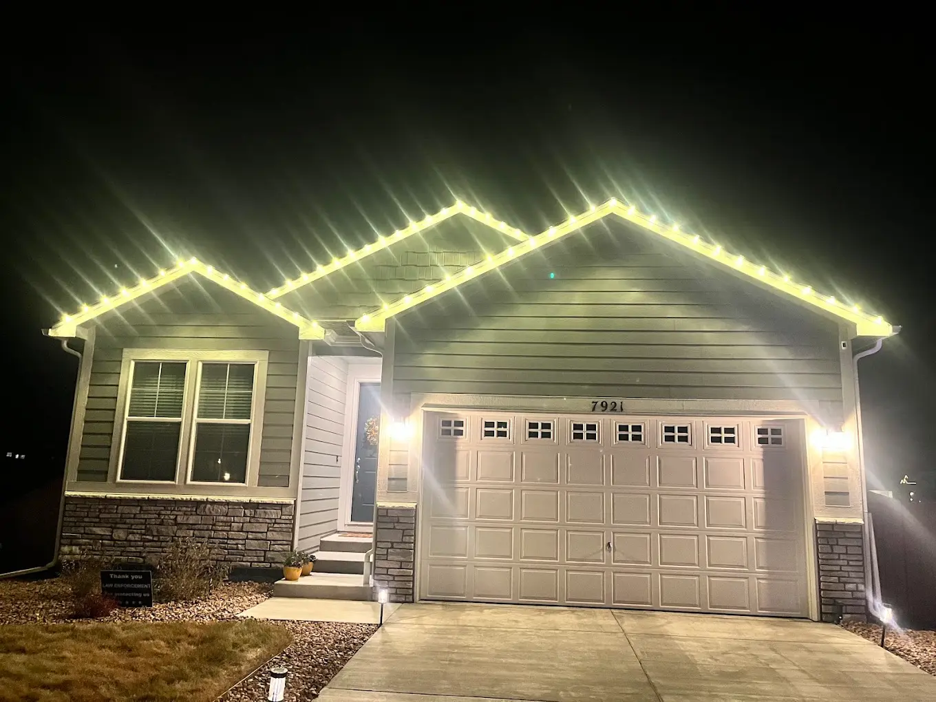 Front Range portfolio: warm white LED roofline lighting on a single-family home